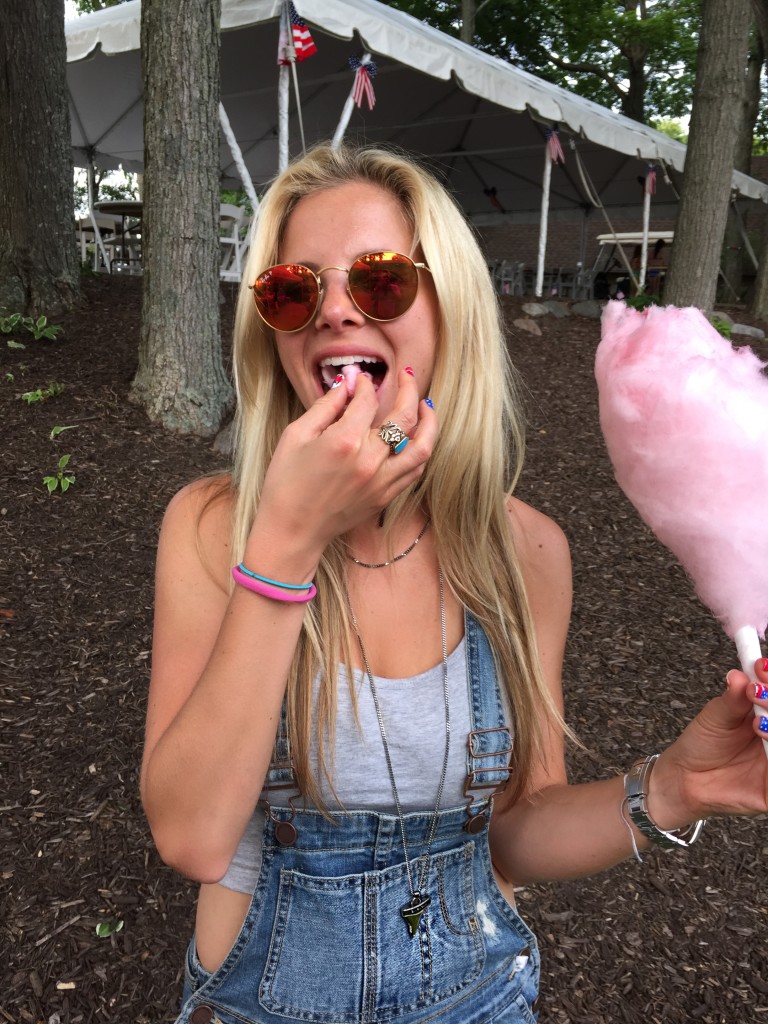 red mirrored circle ray-bans, givenchy sharktooth necklace, girl eating cotton candy