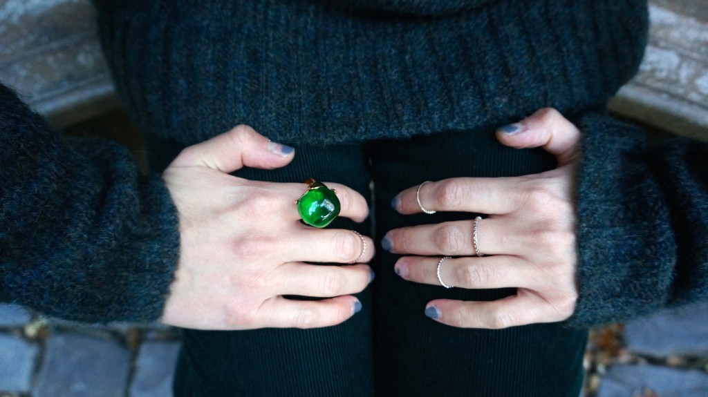 green cocktail ring and midi rings